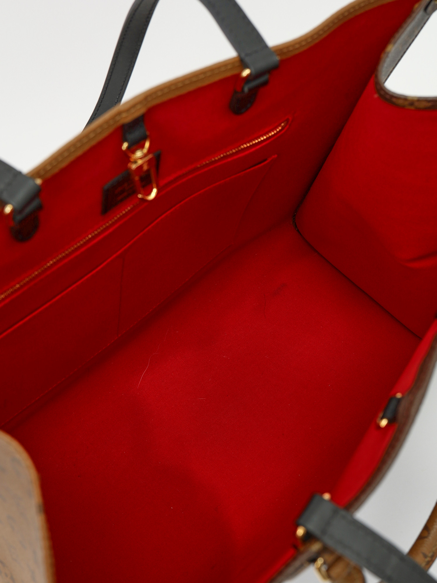 Сумки Louis Vuitton OnTheGo изображение #10
