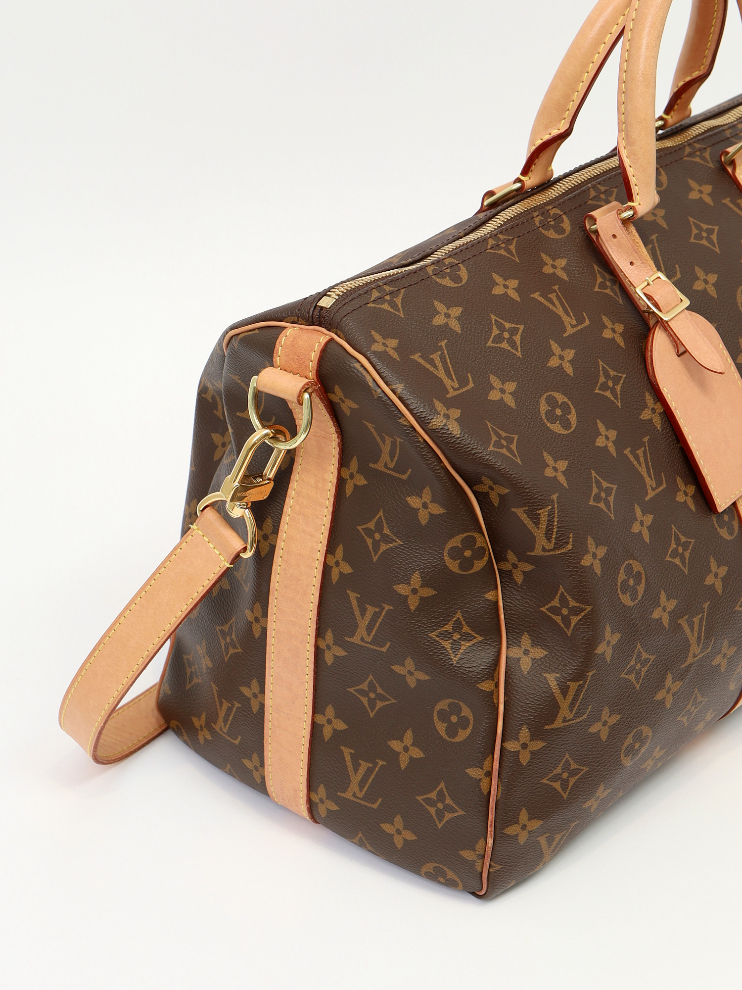 Сумки Louis Vuitton Keepall изображение #9